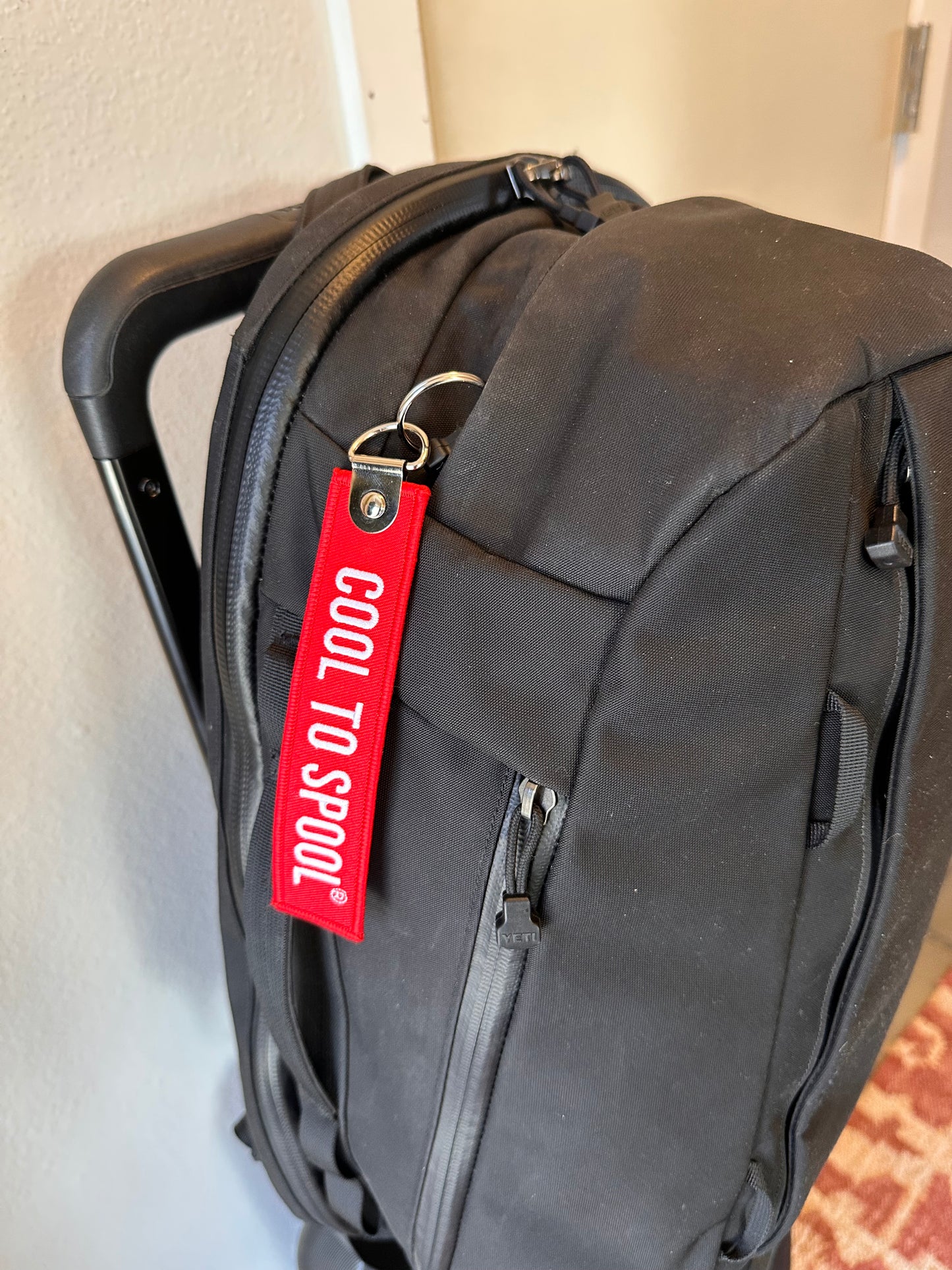Travel "Cool to Spool" bag tag