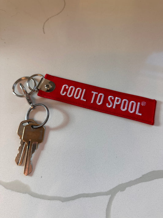 Travel "Cool to Spool" bag tag