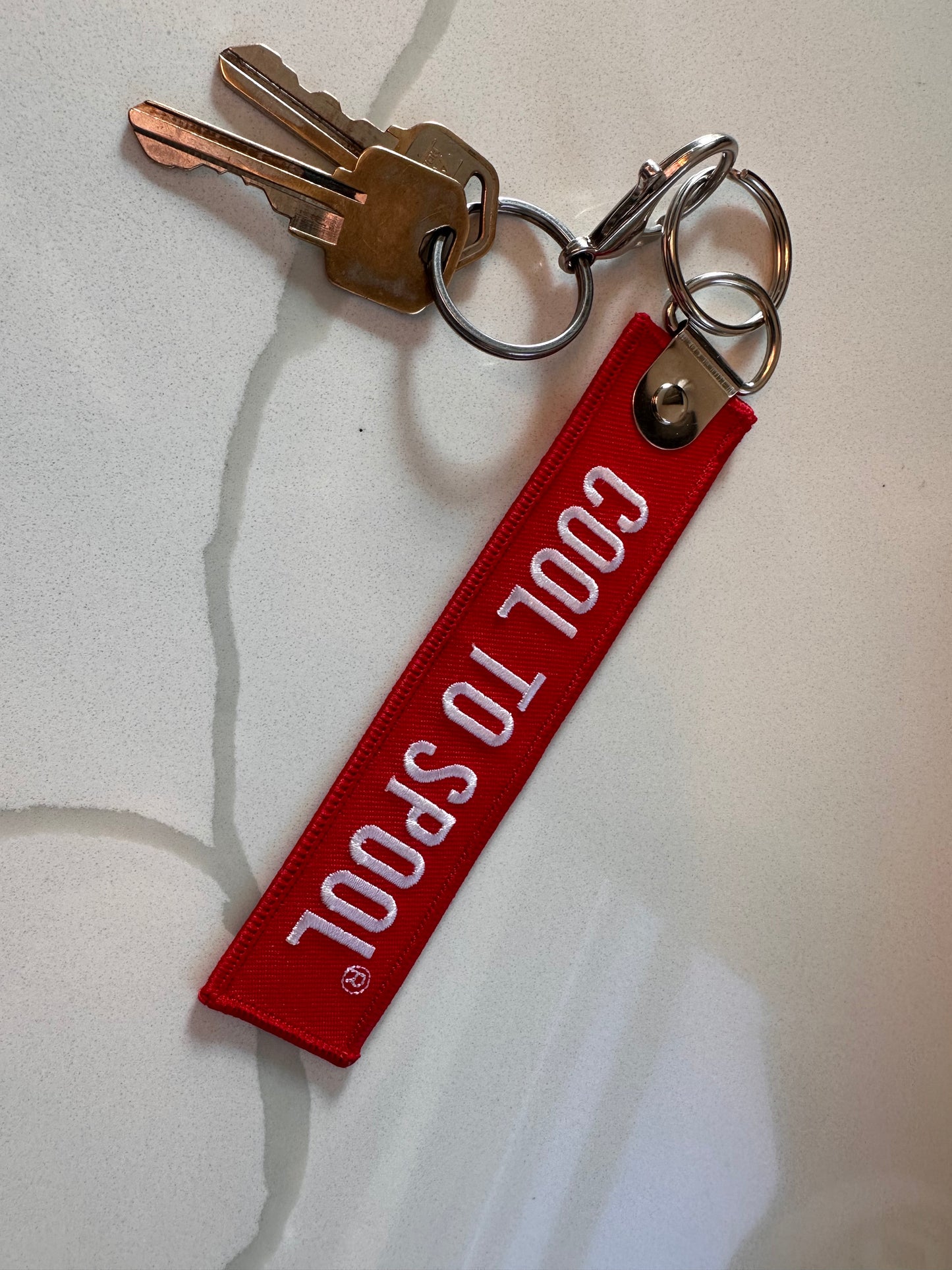 Travel "Cool to Spool" bag tag